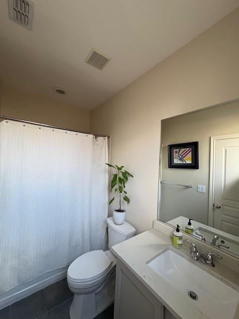 4307 McKinney Avenue, Unit 3 Dallas, TX 75205 - Photo 3 of 10 a bathroom with a sink toilet and a mirror