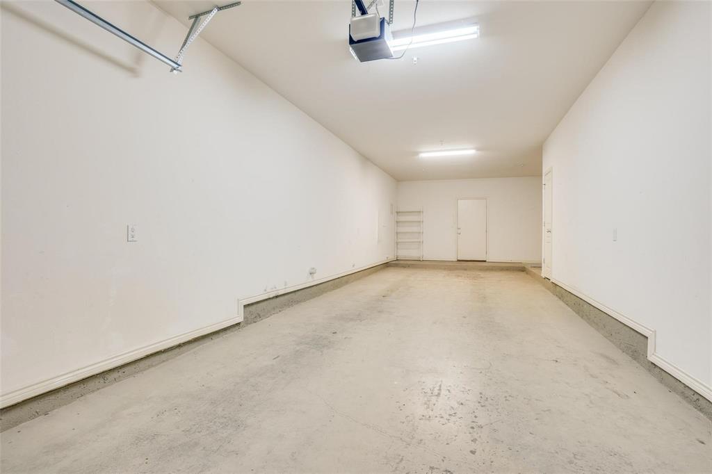4307 McKinney Avenue, Unit 3 Dallas, TX 75205 - Photo 9 of 10 a view of a room with rack and racks on the wall