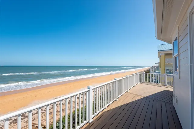 a view of balcony with wooden floor