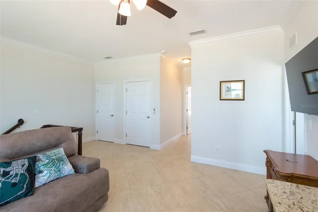 a living room with furniture and a couch