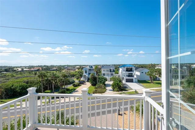 a view of a porch and garden