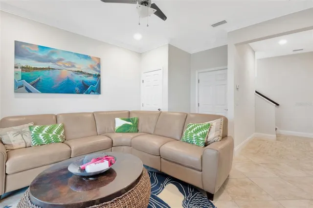 a living room with furniture and a white couch