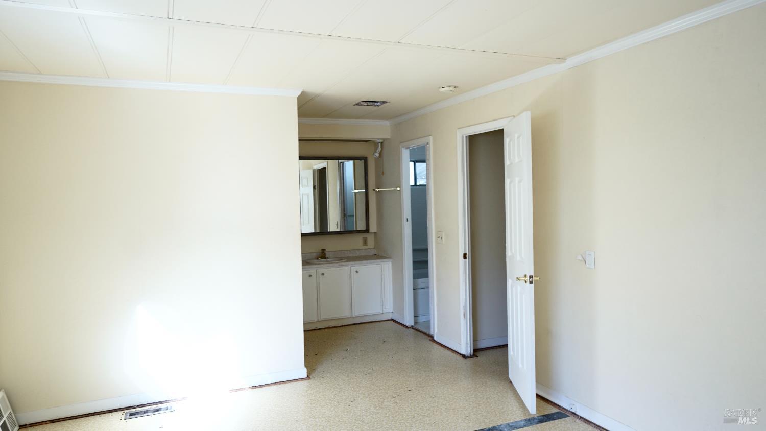 2412 Foothill Boulevard, Unit 63 Calistoga, CA 94515 - Photo 17 of 28 Main bedroom looking toward bath