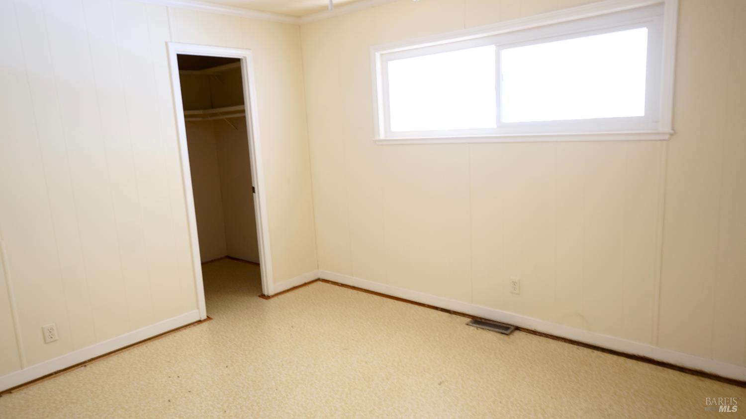 2412 Foothill Boulevard, Unit 63 Calistoga, CA 94515 - Photo 21 of 28 Guest bedroom with no furniture.