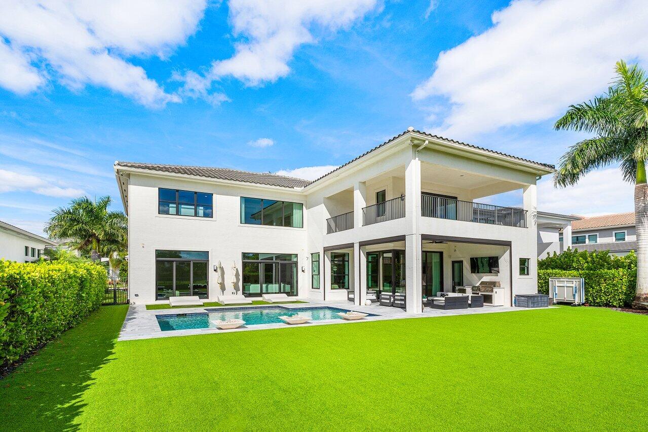 9276 Biaggio Road Boca Raton, FL 33496 - Photo 50 of 70 a front view of house with yard