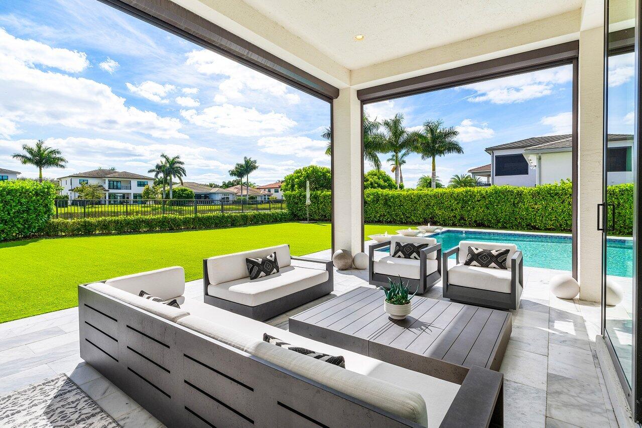 9276 Biaggio Road Boca Raton, FL 33496 - Photo 52 of 70 a sitting area with furniture and city view