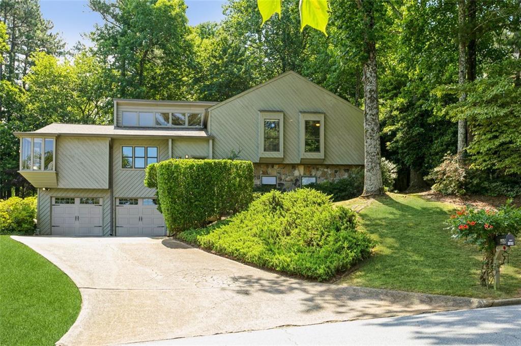 160 Spring Ridge Drive Roswell, GA 30076 - Photo 1 of 1 Great curb appeal in this modern contemporary home