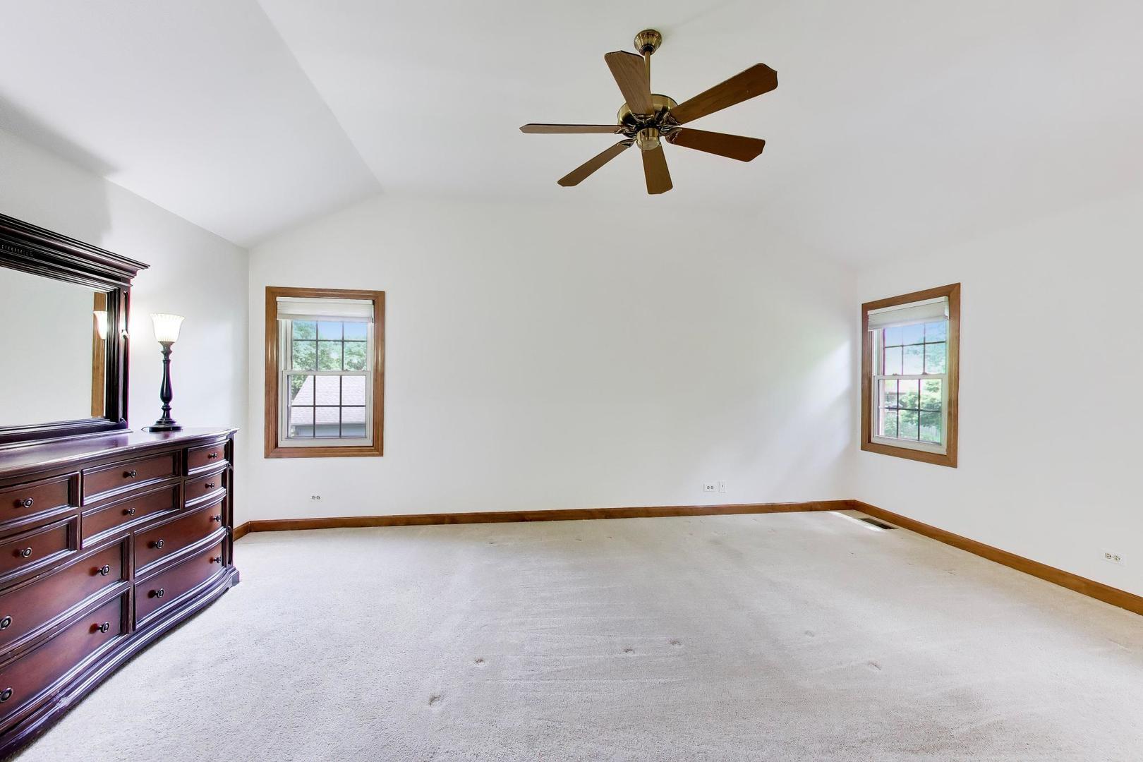 1528 Sequoia Road Naperville, IL 60540 - Photo 23 of 34 wooden floor in an empty room with a window