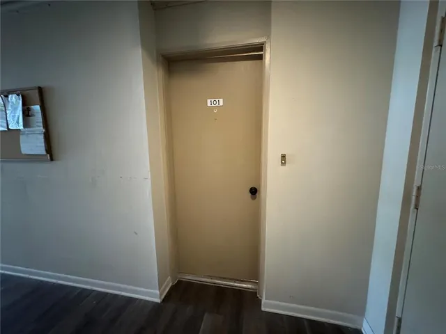 a lobby with furniture and window