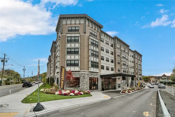 a front view of a building with street view