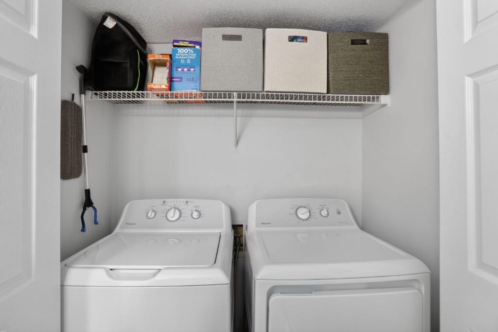 6900 Roswell Road, Unit L7 Atlanta, GA 30328 - Photo 15 of 25 a utility room with dryer and washer