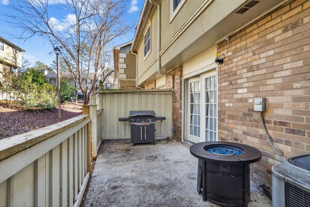 6900 Roswell Road, Unit L7 Atlanta, GA 30328 - Photo 24 of 25 a view of a house with backyard and sitting area