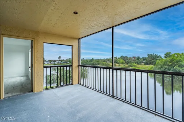 a view of balcony with floor to ceiling window and stairs