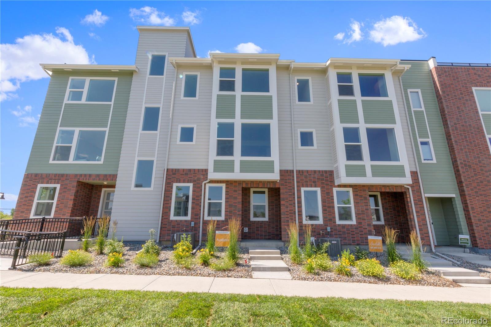 a front view of a multi story residential apartment building
