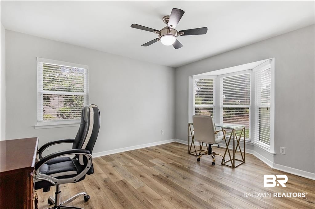 1624 Apex Drive Mobile, AL 36693 - Photo 25 of 29 Home office featuring ceiling fan and light hardwood / wood-style flooring