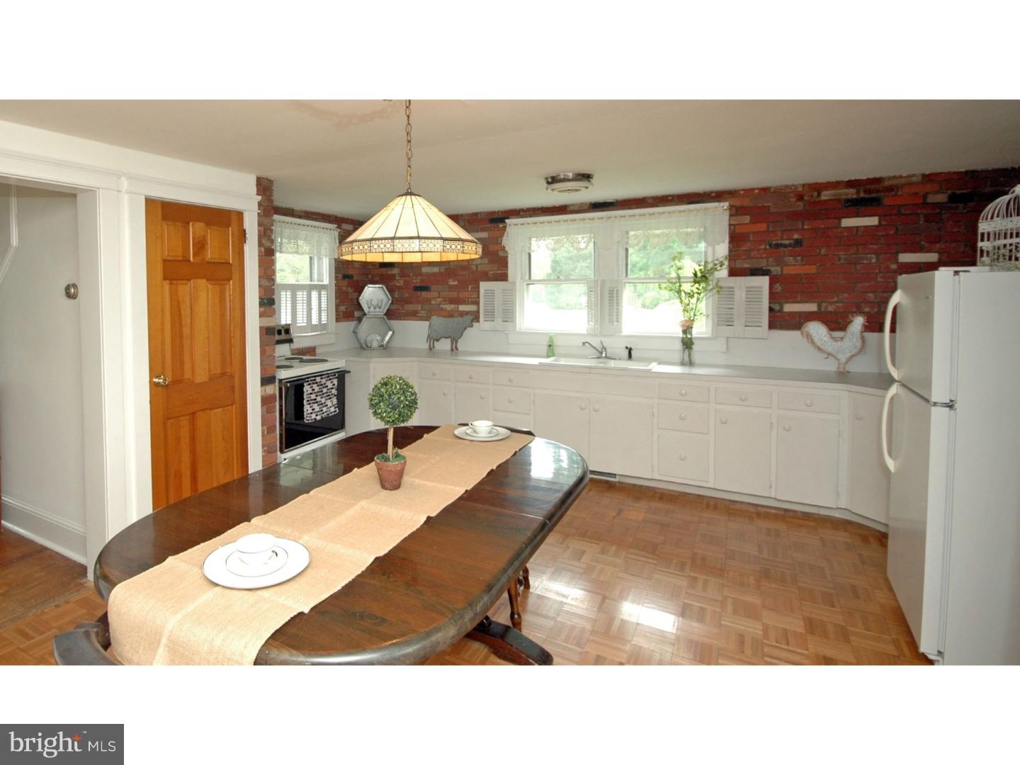 4211 Bridgeboro Road Moorestown, NJ 08057 - Photo 12 of 25 a kitchen with a table and chairs