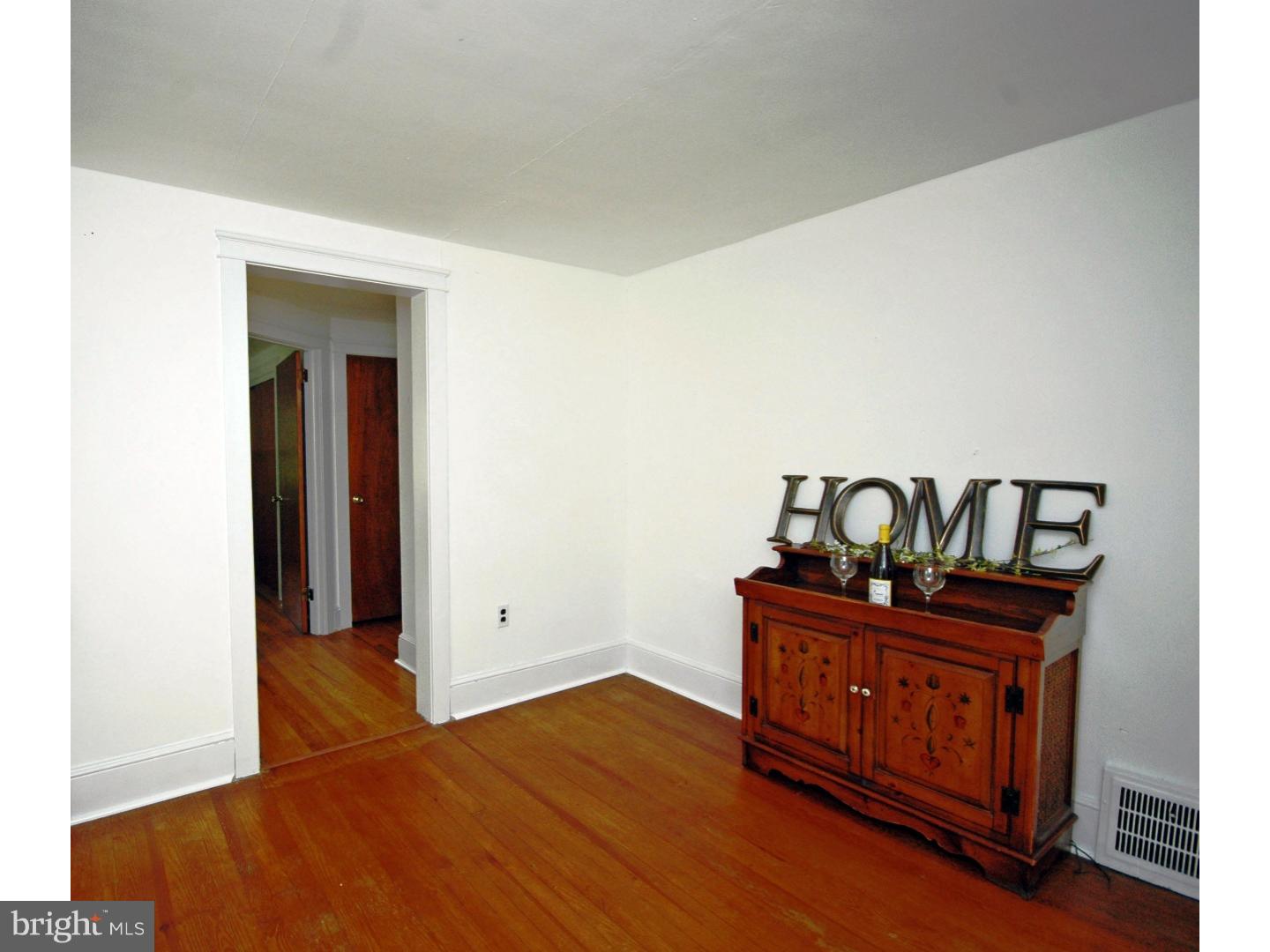 4211 Bridgeboro Road Moorestown, NJ 08057 - Photo 17 of 25 a bedroom with a bed and wooden floor