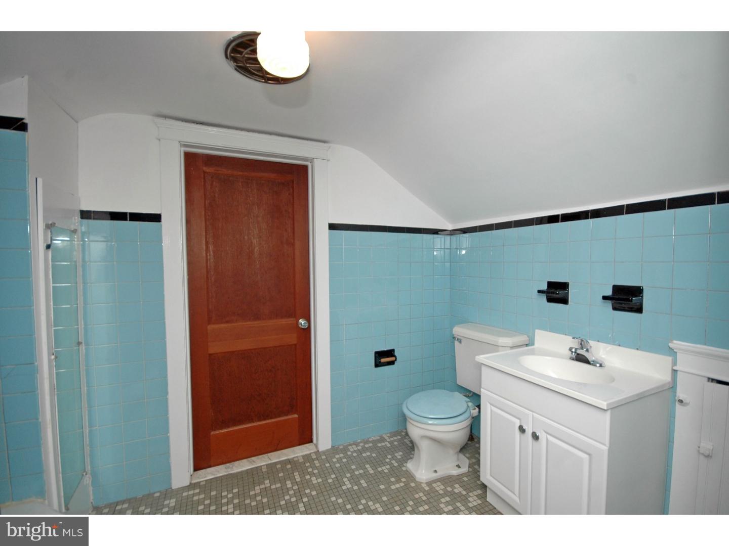 4211 Bridgeboro Road Moorestown, NJ 08057 - Photo 22 of 25 a bathroom with a sink a toilet and shower