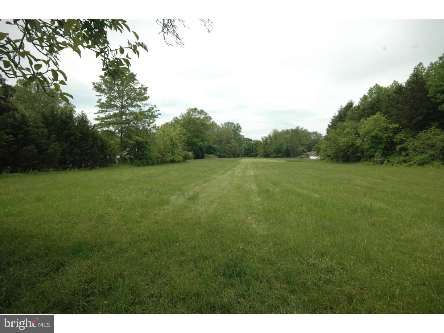 4211 Bridgeboro Road Moorestown, NJ 08057 - Photo 23 of 25 a view of a field with trees in the background