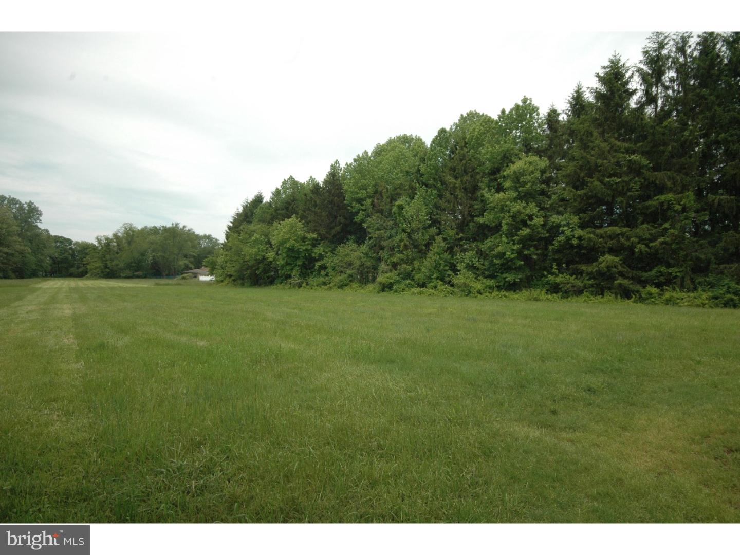 4211 Bridgeboro Road Moorestown, NJ 08057 - Photo 24 of 25 a view of a grassy field with trees