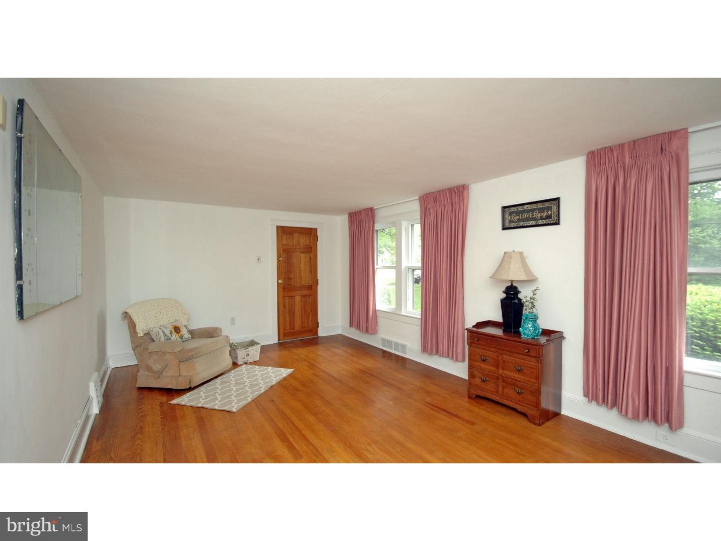 4211 Bridgeboro Road Moorestown, NJ 08057 - Photo 10 of 25 a living room with furniture and window