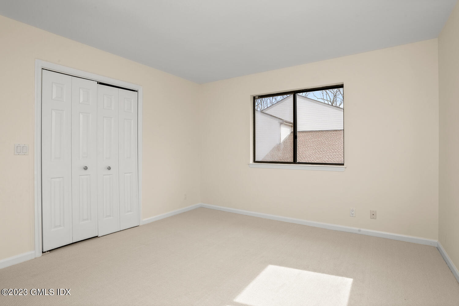 500 River Road, Unit 5 Cos Cob, CT 06807 - Photo 20 of 30 an empty room with a window