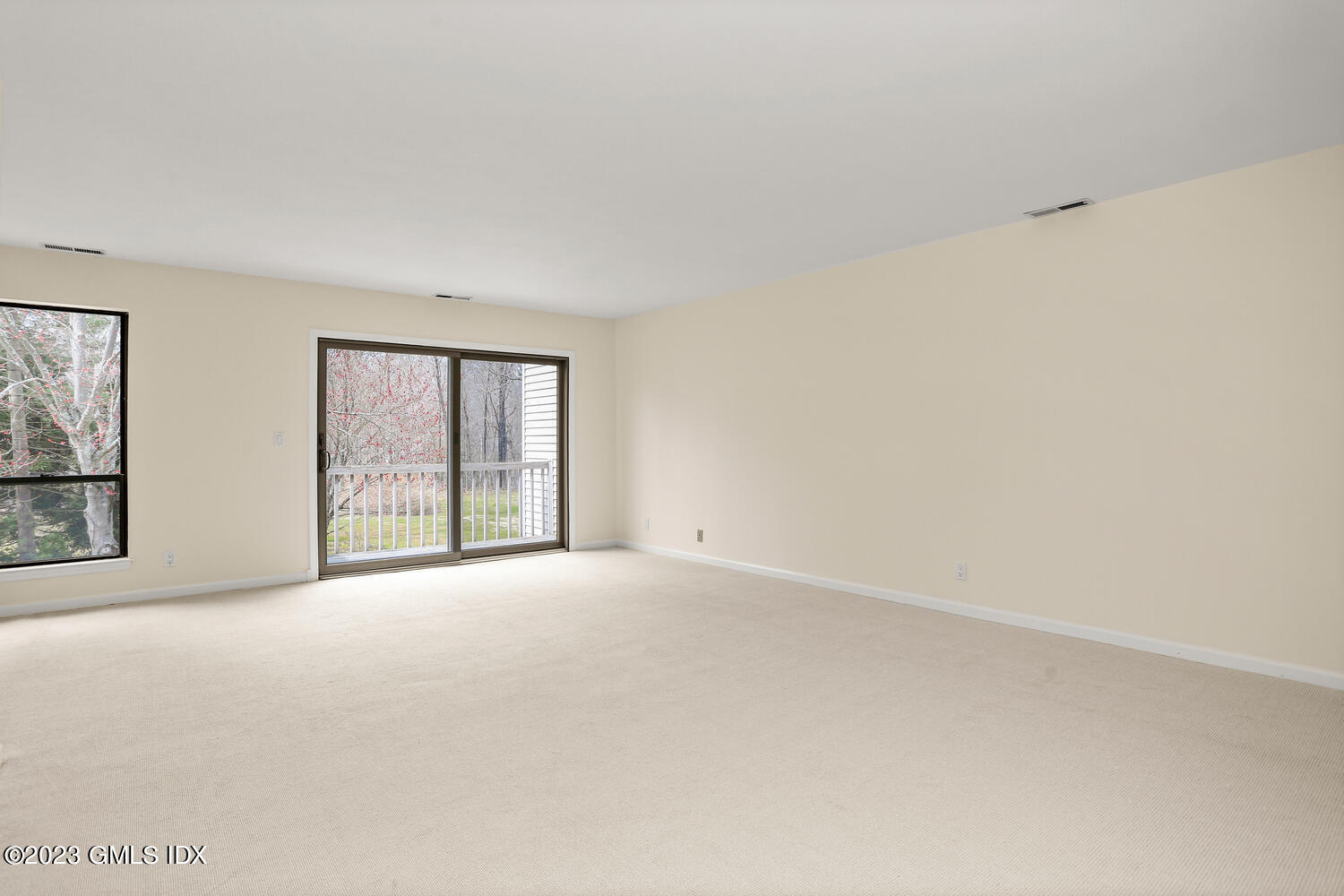 500 River Road, Unit 5 Cos Cob, CT 06807 - Photo 10 of 30 an empty room with windows