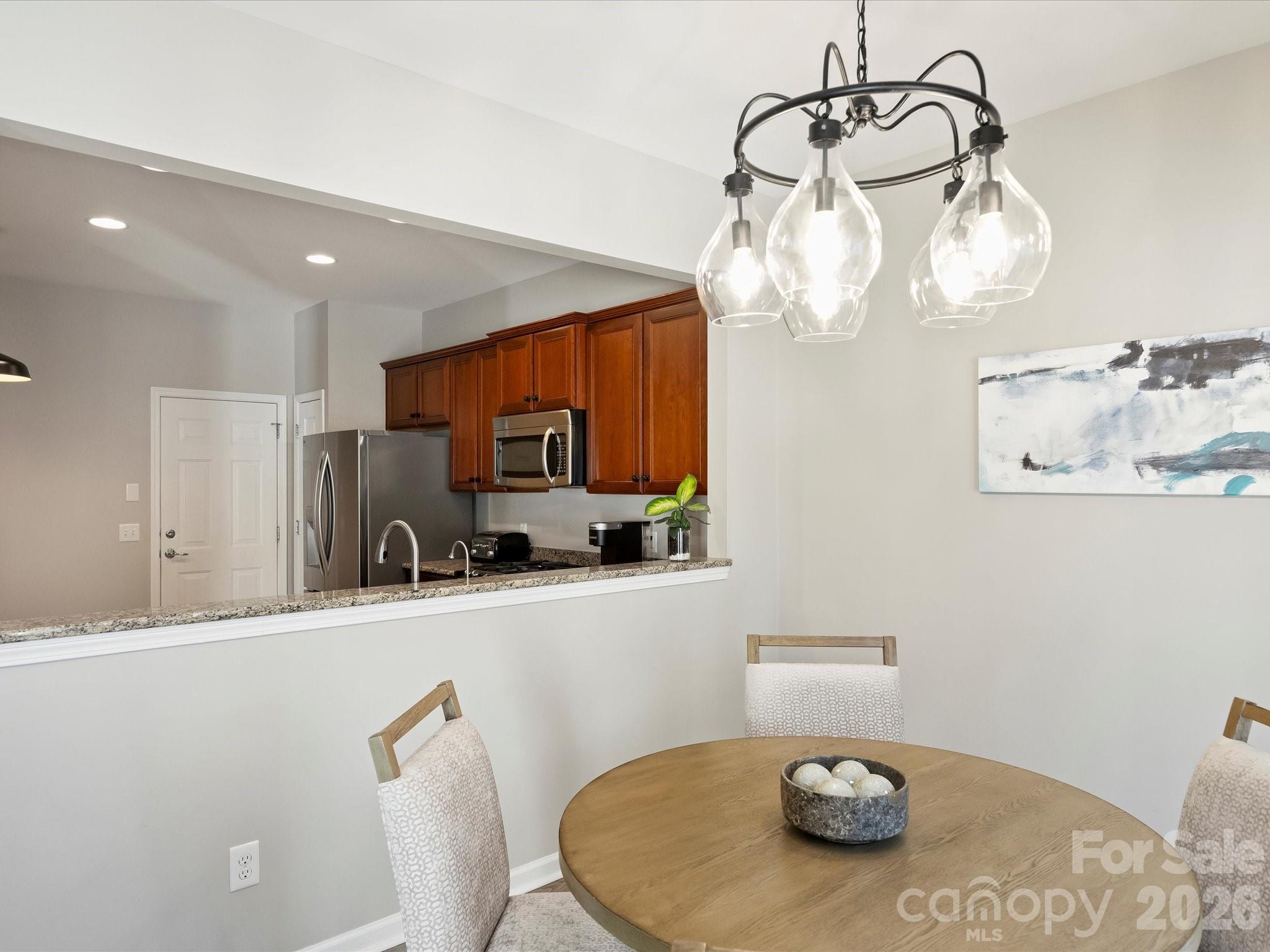 15544 Canmore Street Charlotte, NC 28277 - Photo 12 of 36 a bathroom with a sink a toilet and mirror