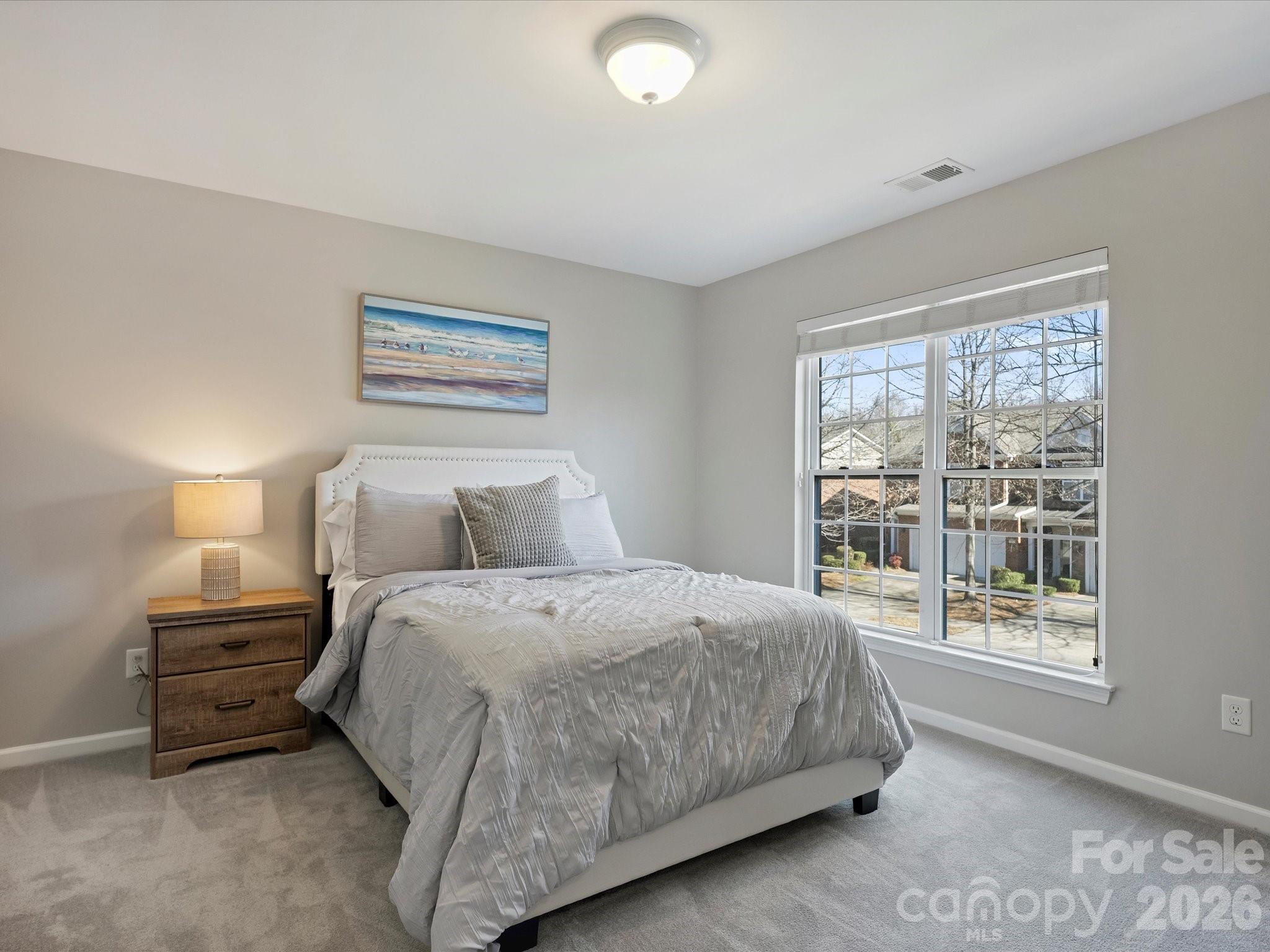 15544 Canmore Street Charlotte, NC 28277 - Photo 29 of 36 a bedroom with a bed and a window