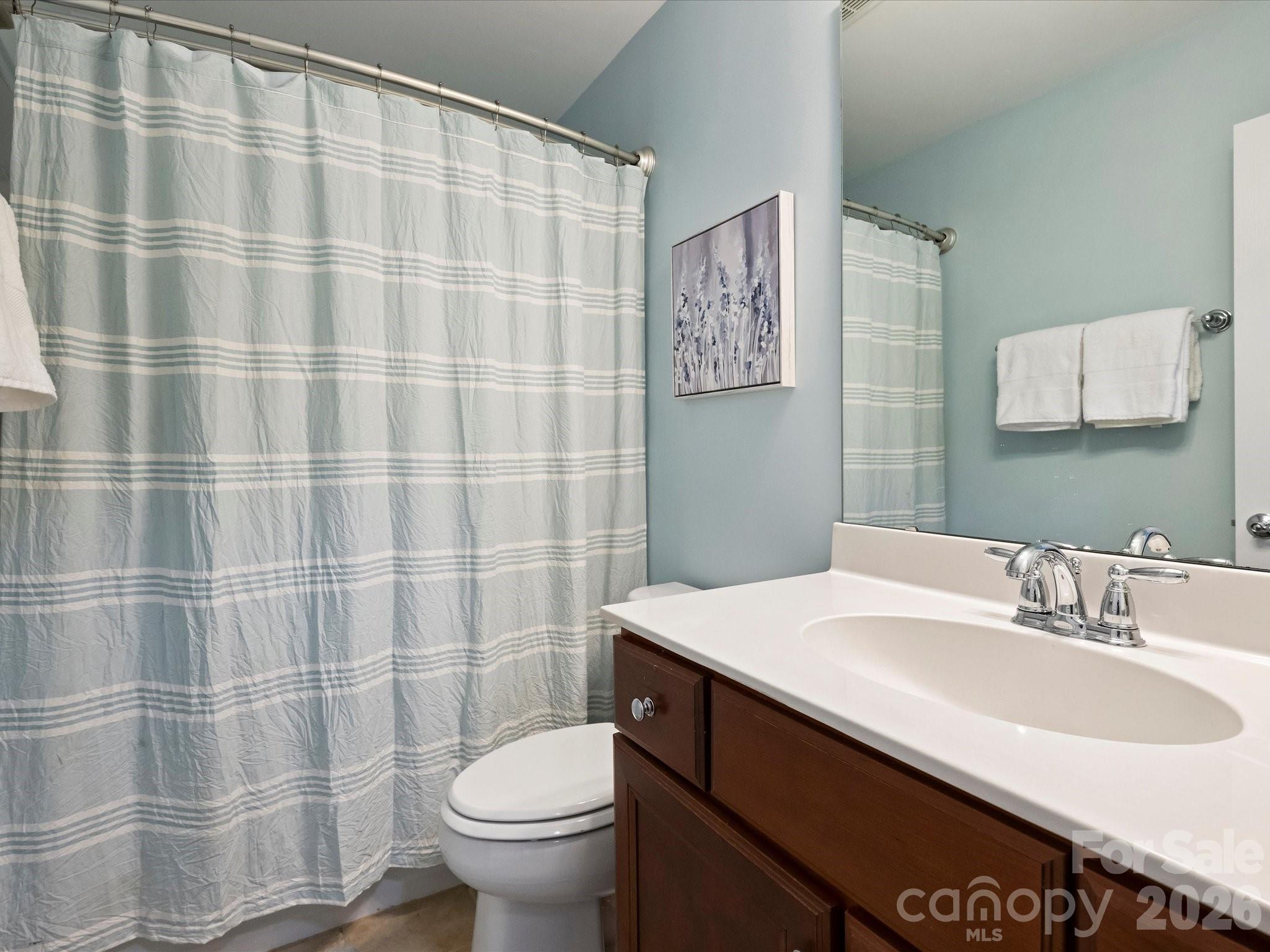 15544 Canmore Street Charlotte, NC 28277 - Photo 31 of 36 a bathroom with a sink toilet and shower