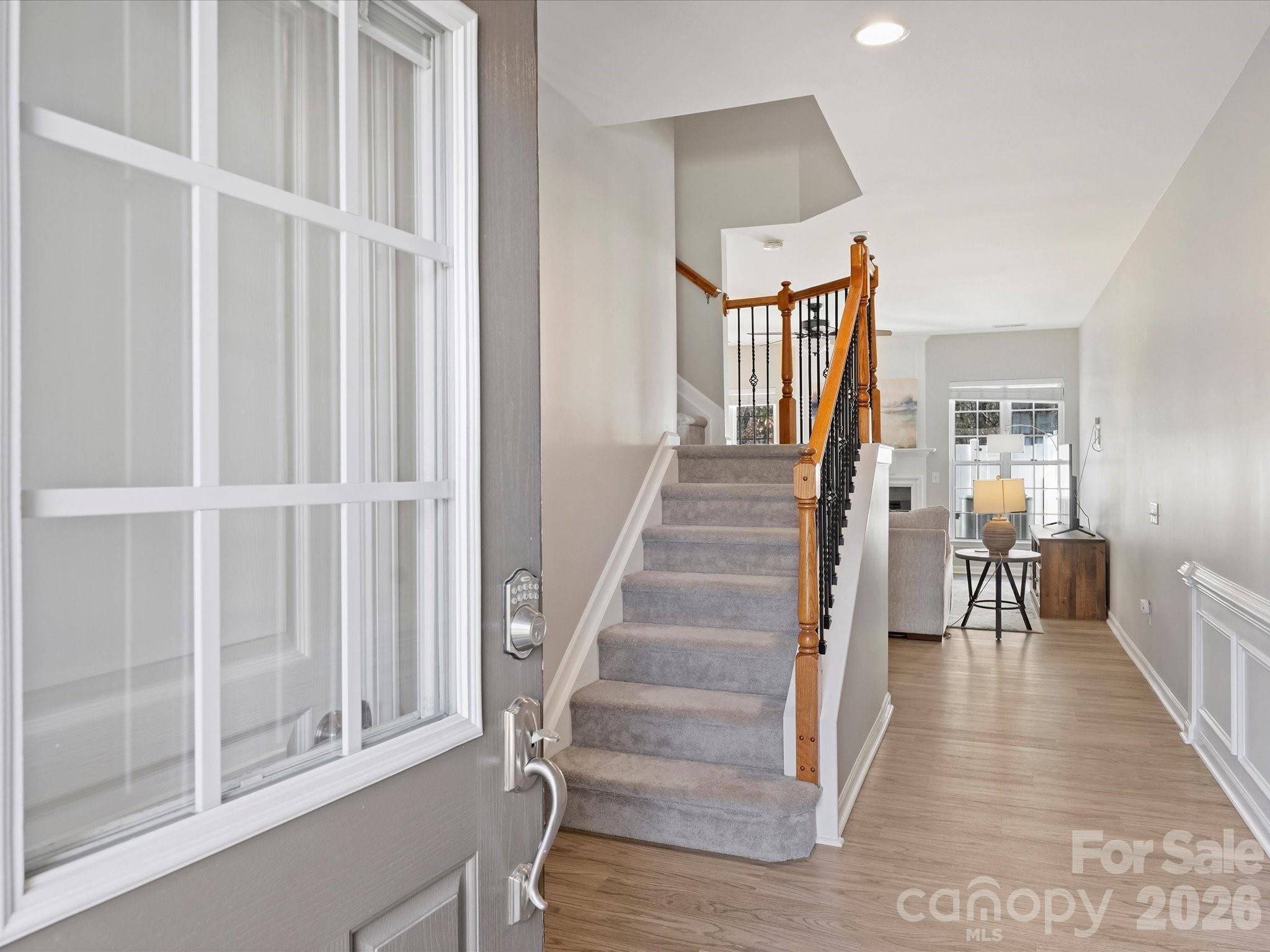 15544 Canmore Street Charlotte, NC 28277 - Photo 4 of 36 a view of entryway with wooden floor and windows