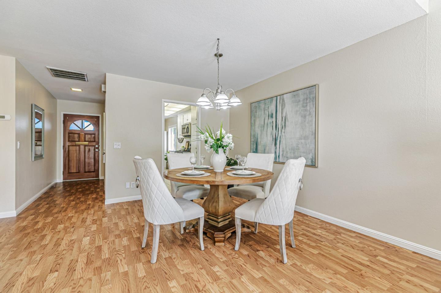 6200 Gerdts Drive San Jose, CA 95135 - Photo 17 of 39 a view of a dining room with furniture window and wooden floor