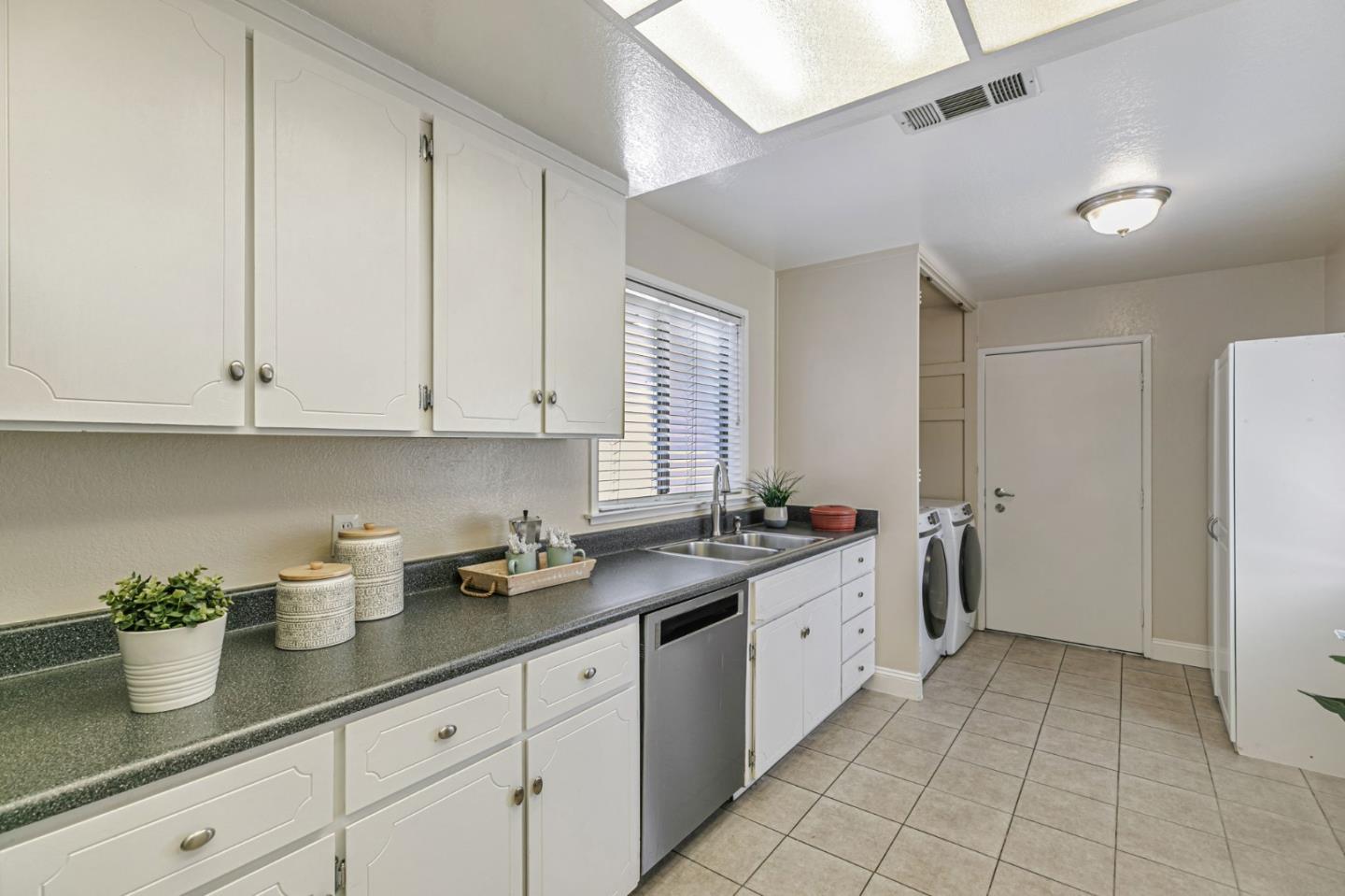 6200 Gerdts Drive San Jose, CA 95135 - Photo 19 of 39 a kitchen with a sink and cabinets