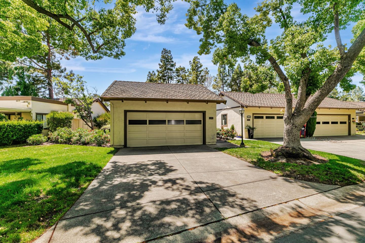 6200 Gerdts Drive San Jose, CA 95135 - Photo 2 of 39 a front view of a house with a garden and trees