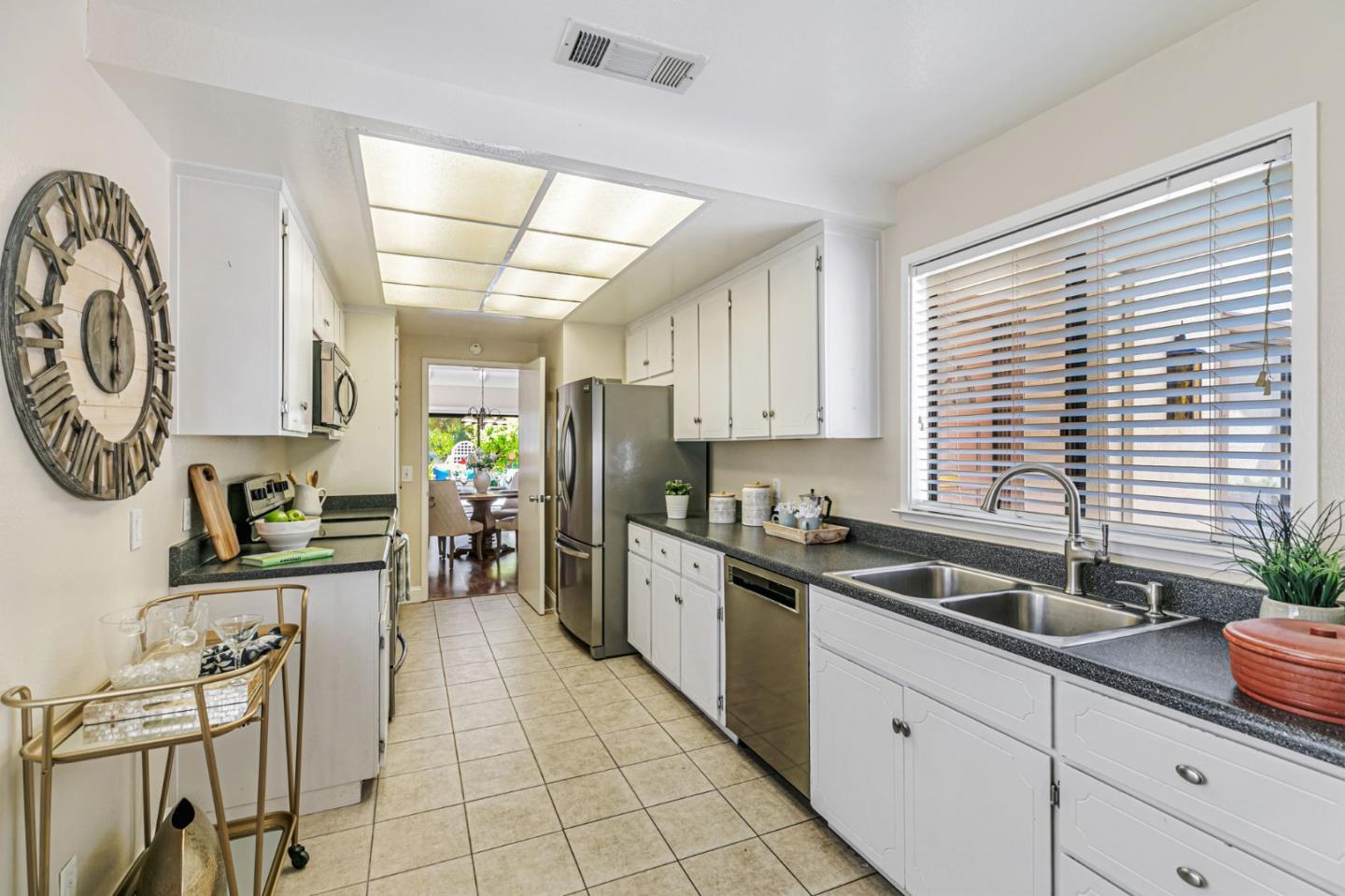 6200 Gerdts Drive San Jose, CA 95135 - Photo 5 of 39 a kitchen with a sink cabinets and window