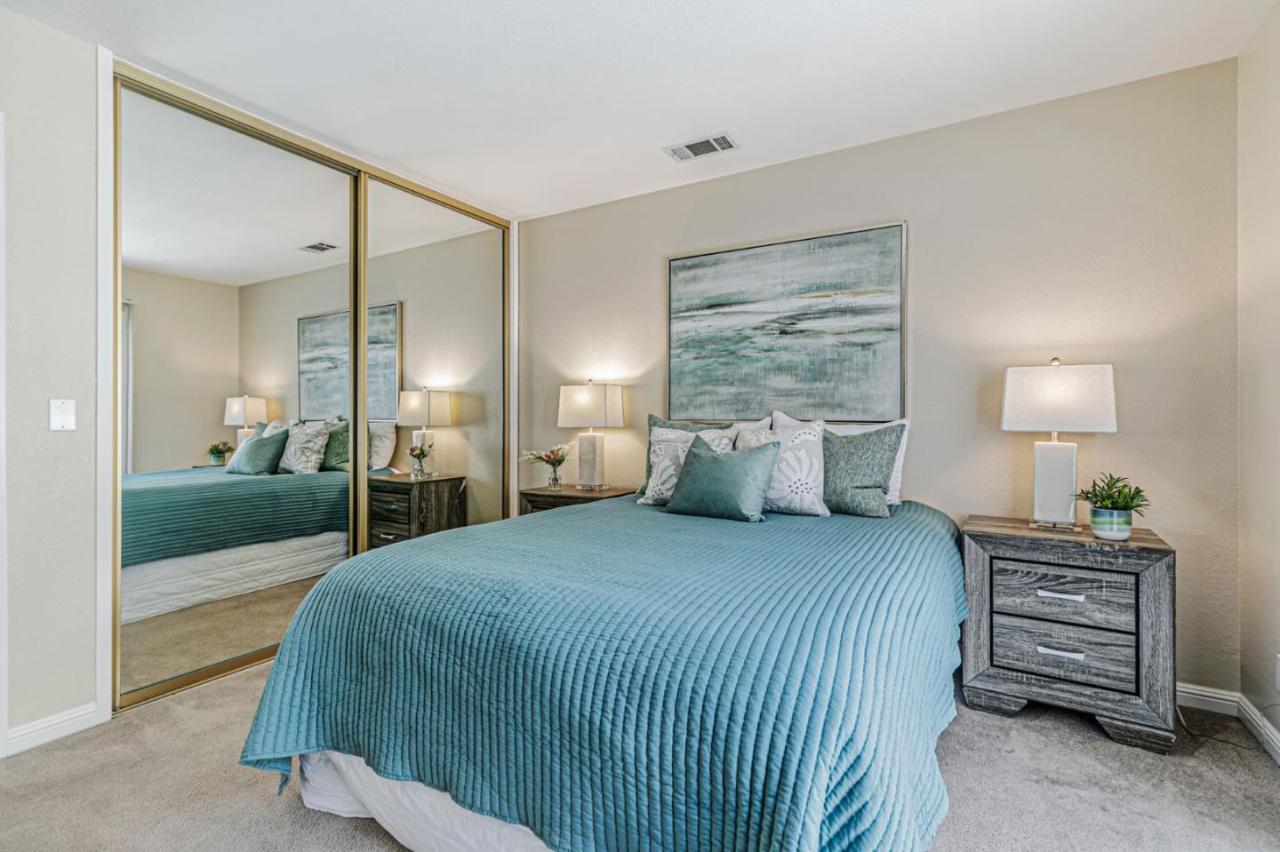 6200 Gerdts Drive San Jose, CA 95135 - Photo 6 of 39 a bedroom with a bed and a couch