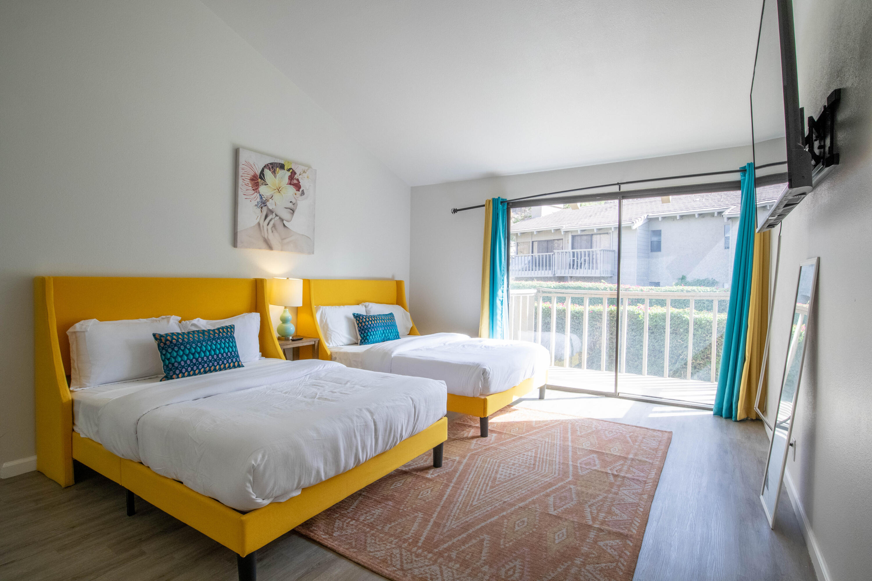 46560 Arapahoe Circle, Unit B Indian Wells, CA 92210 - Photo 11 of 17 a bedroom with a bed and a large window