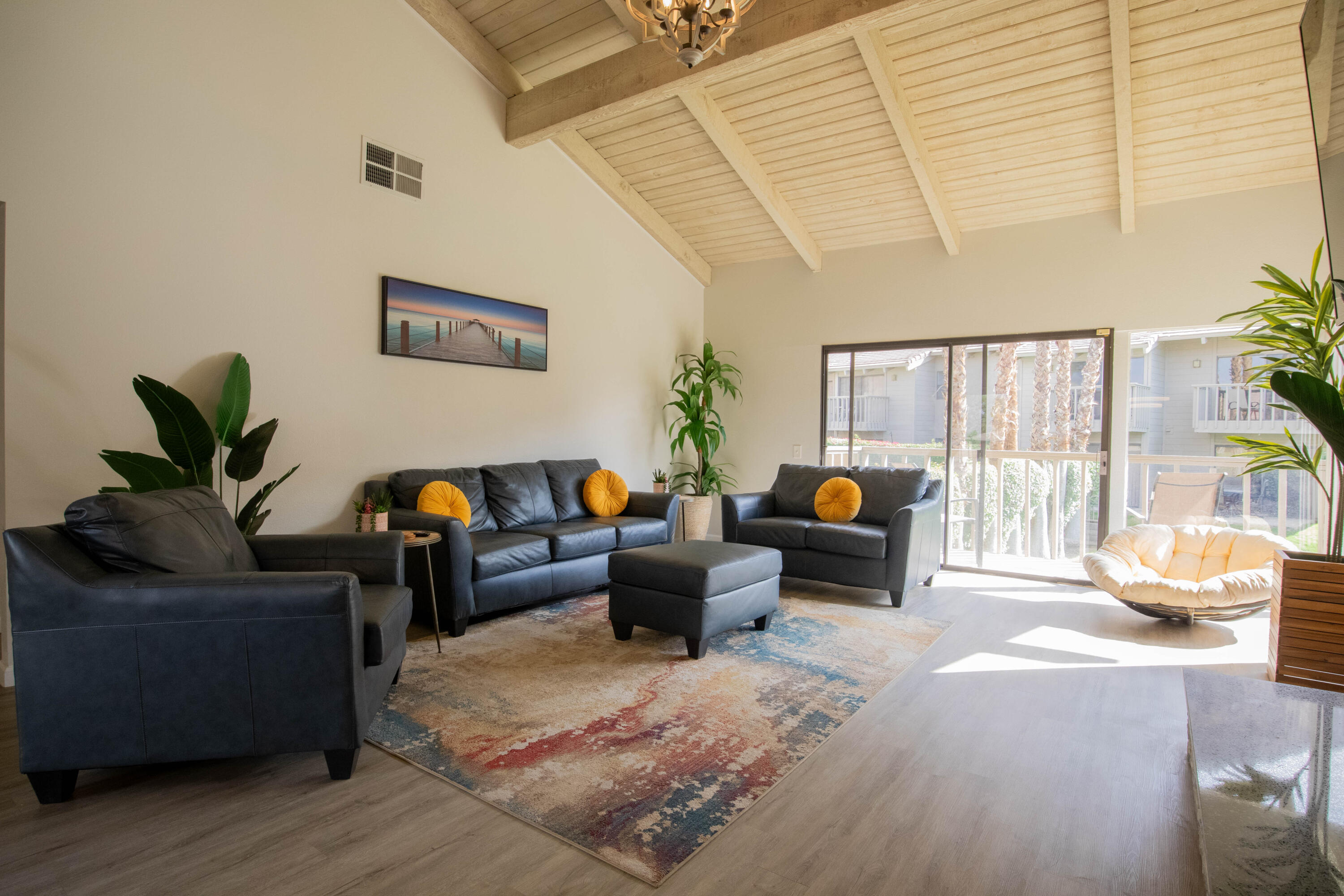 46560 Arapahoe Circle, Unit B Indian Wells, CA 92210 - Photo 5 of 17 a living room with furniture and a large window