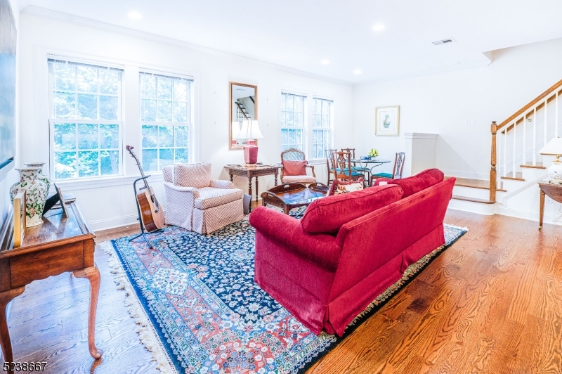 29 Euclid Avenue, Unit 203 Summit, NJ 07901 - Photo 3 of 25 a living room with furniture rug and wooden floor