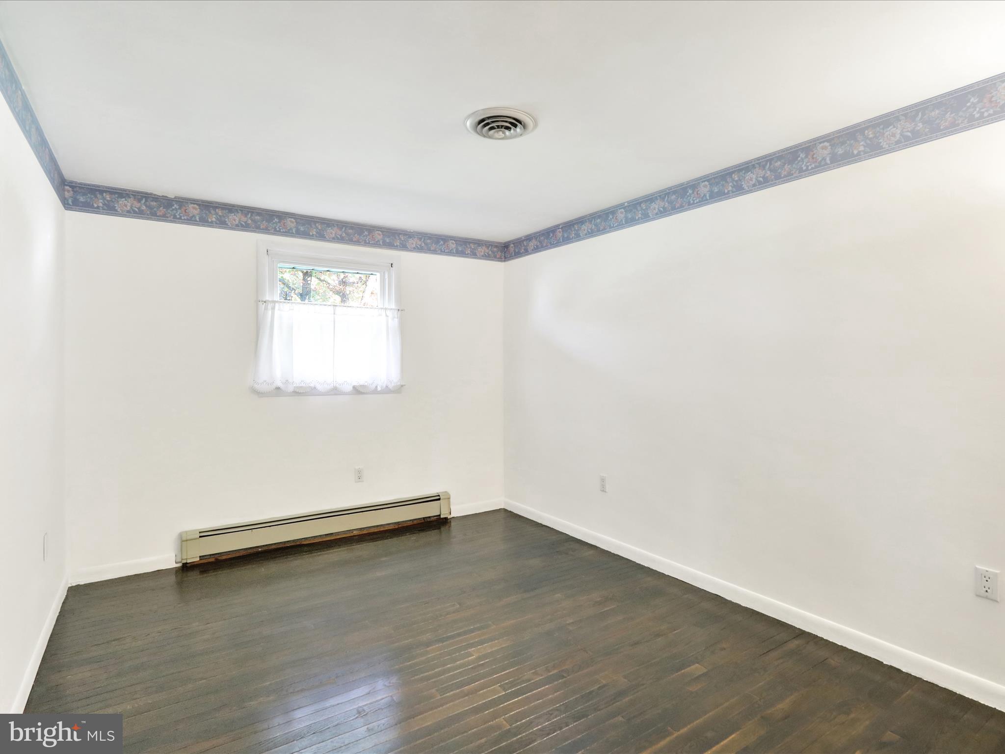 3908 Reading Crest Avenue Reading, PA 19605 - Photo 15 of 34 a view of a room with wooden floor and window