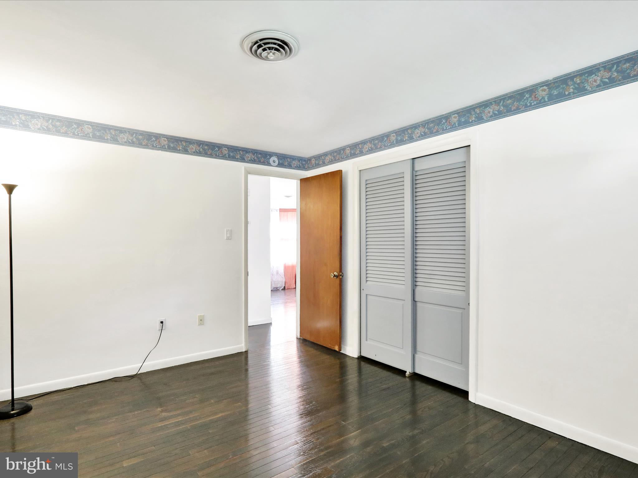 3908 Reading Crest Avenue Reading, PA 19605 - Photo 16 of 34 a view of an empty room with wooden floor