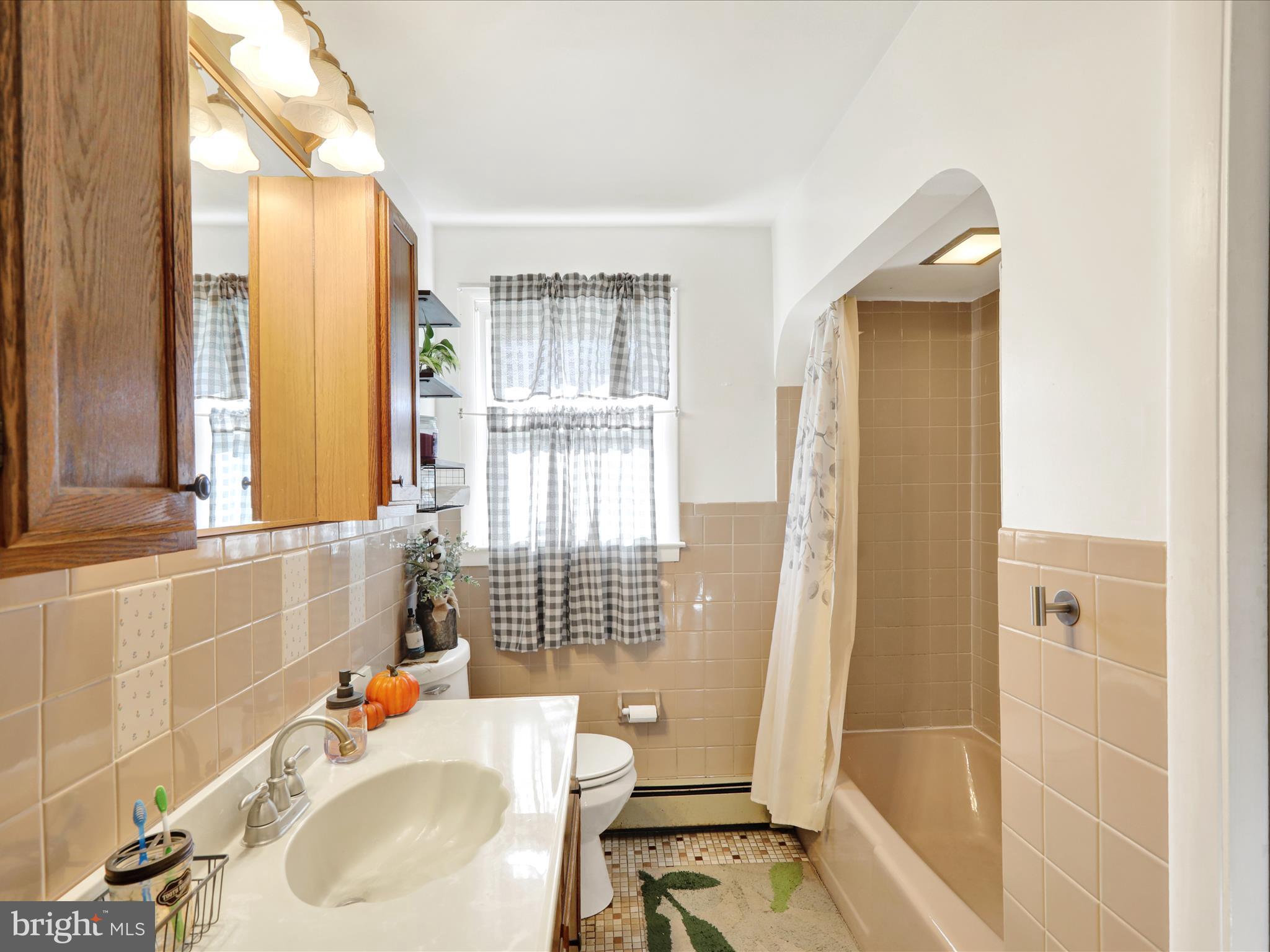 3908 Reading Crest Avenue Reading, PA 19605 - Photo 18 of 34 a bathroom with a sink and a bathtub