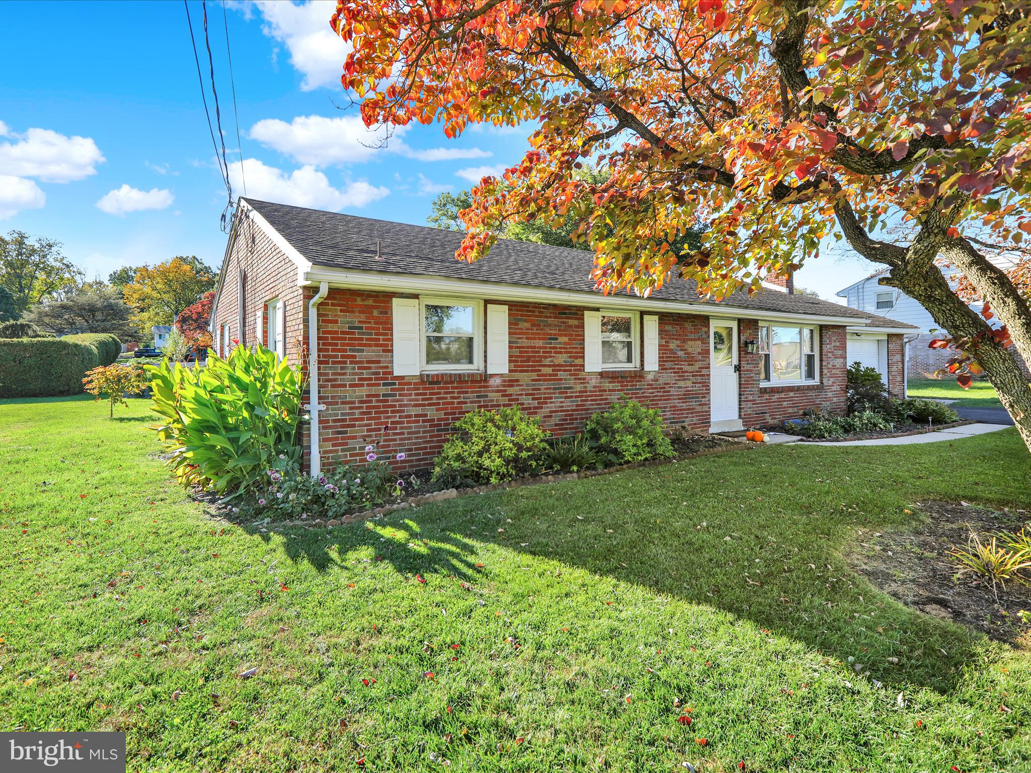 3908 Reading Crest Avenue Reading, PA 19605 - Photo 4 of 34 a front view of house with yard and green space