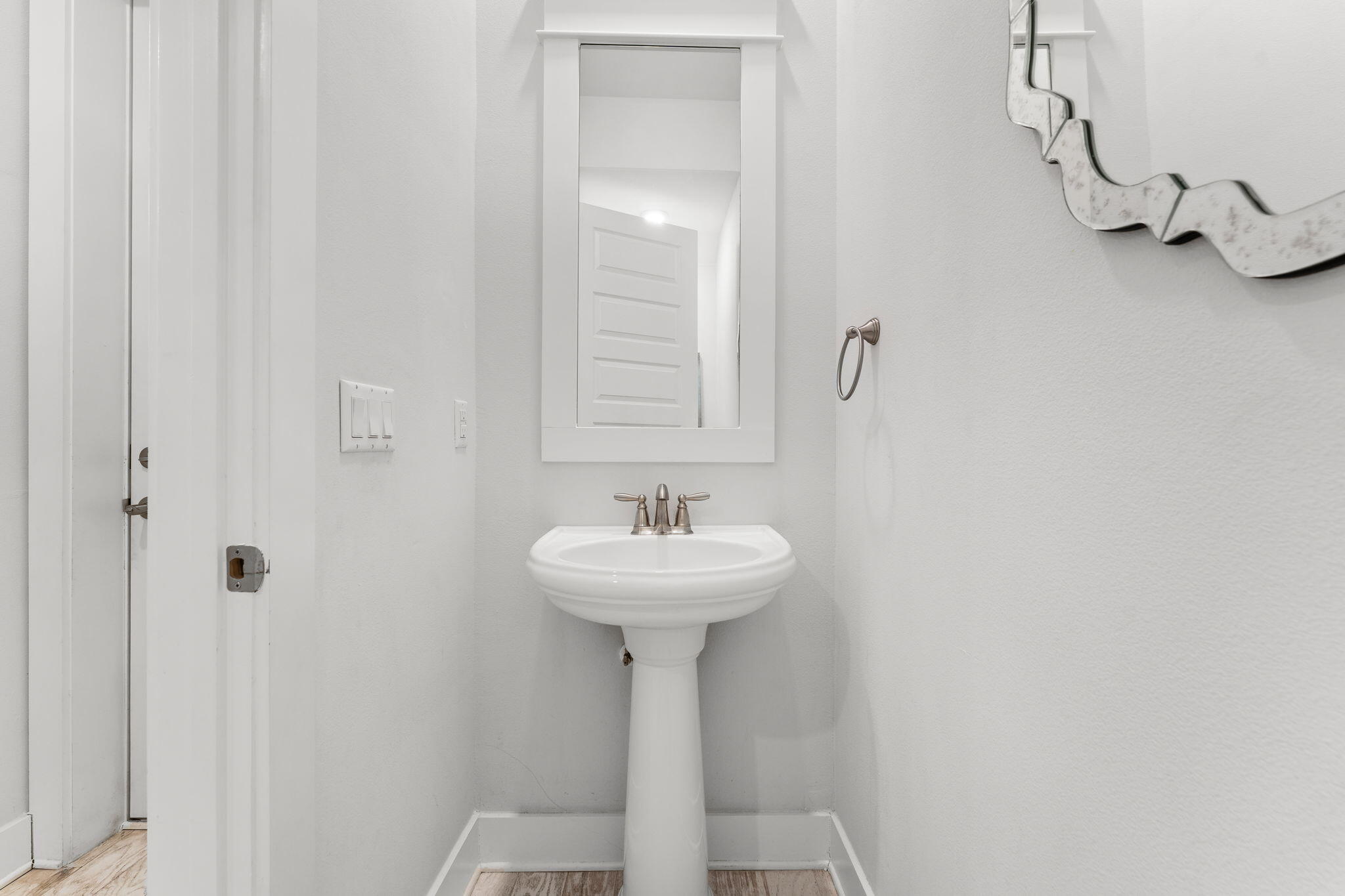 Undisclosed Address Inlet Beach, FL 32461 - Photo 14 of 44 a bathroom with a sink a mirror and a shower