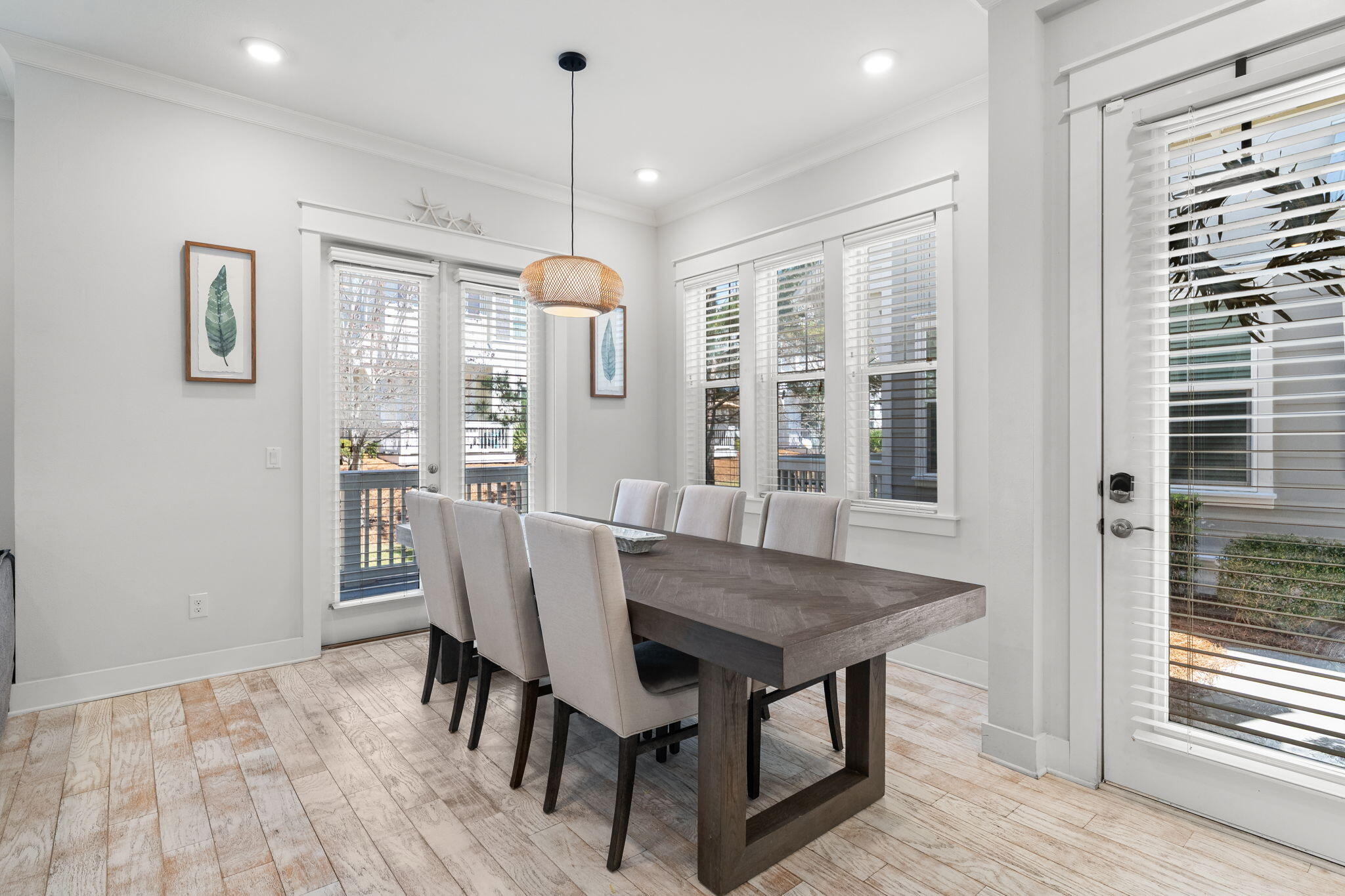 Undisclosed Address Inlet Beach, FL 32461 - Photo 23 of 44 a view of a dining room with furniture window and wooden floor