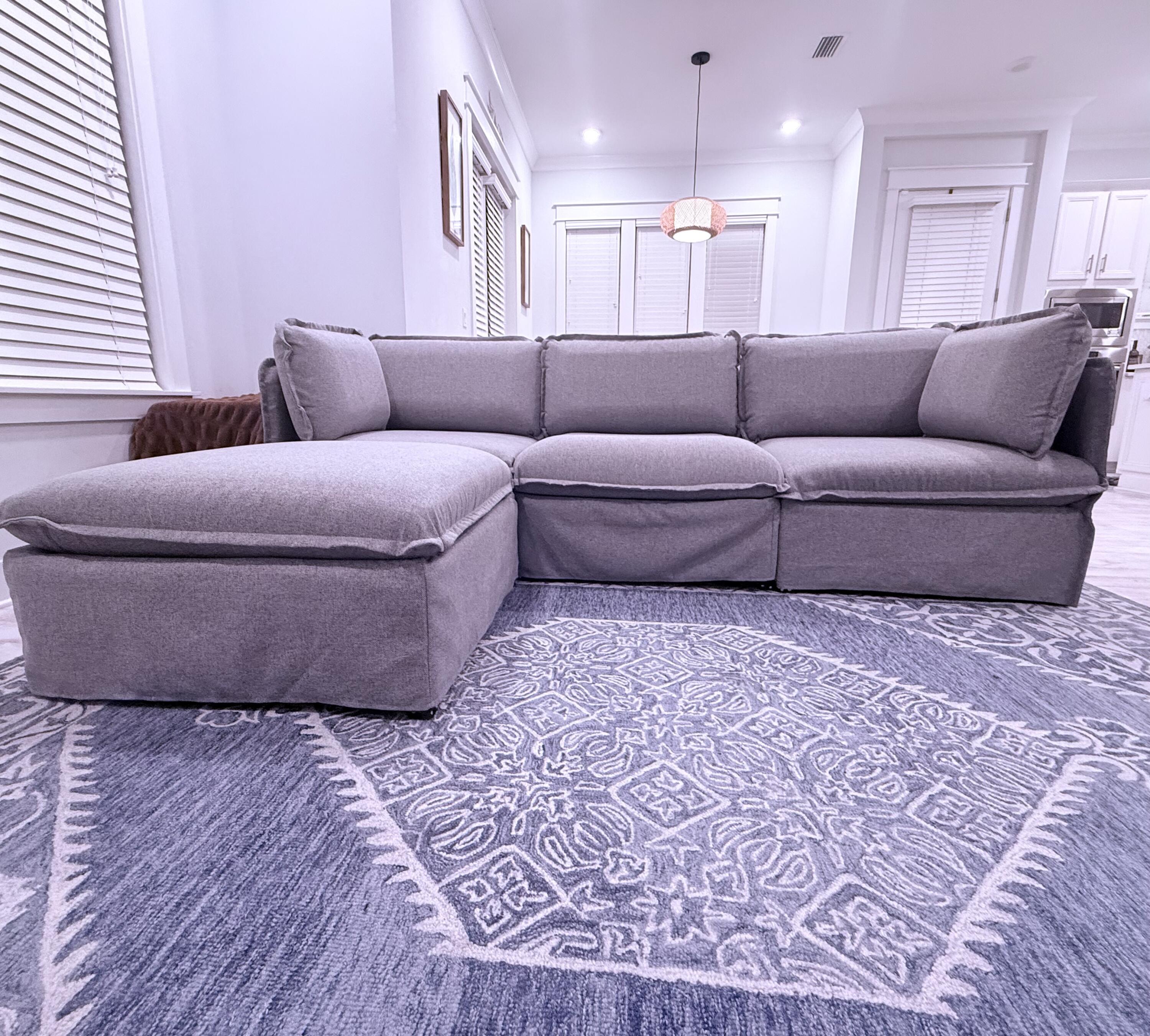 Undisclosed Address Inlet Beach, FL 32461 - Photo 5 of 11 a living room with a couch and a coffee table