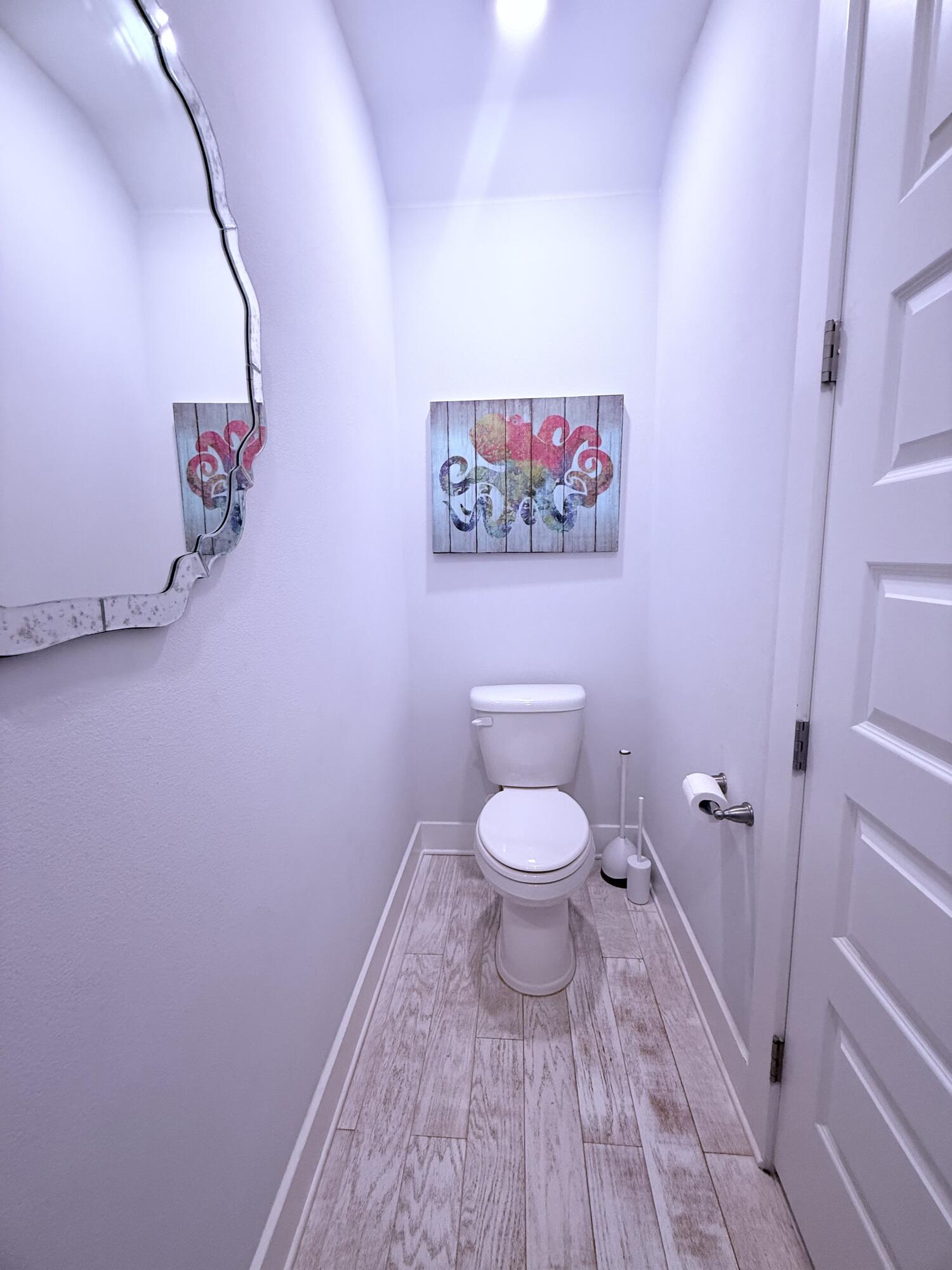 Undisclosed Address Inlet Beach, FL 32461 - Photo 8 of 11 a bathroom with a toilet