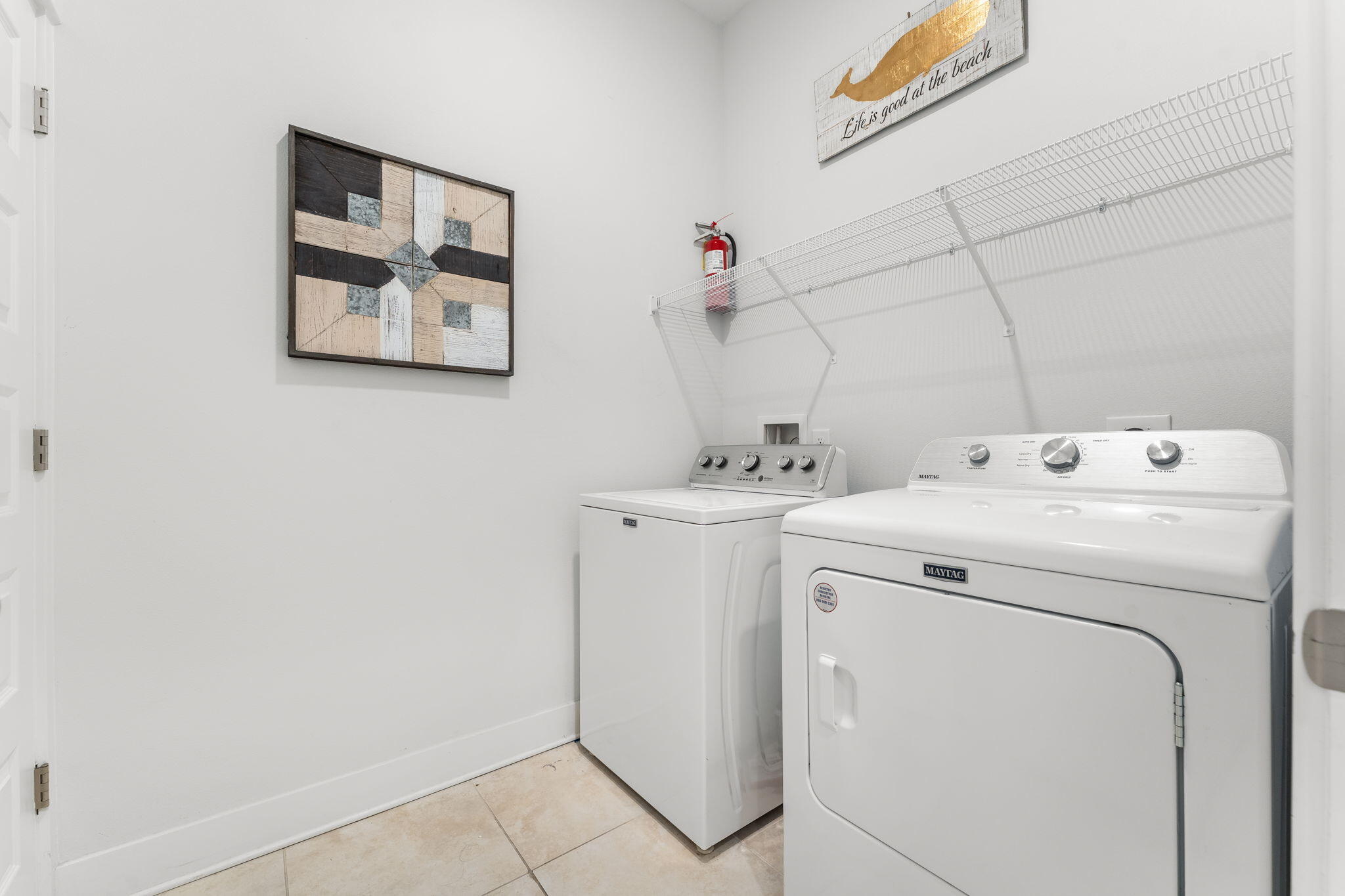 Undisclosed Address Inlet Beach, FL 32461 - Photo 10 of 44 a utility room with dryer and washer