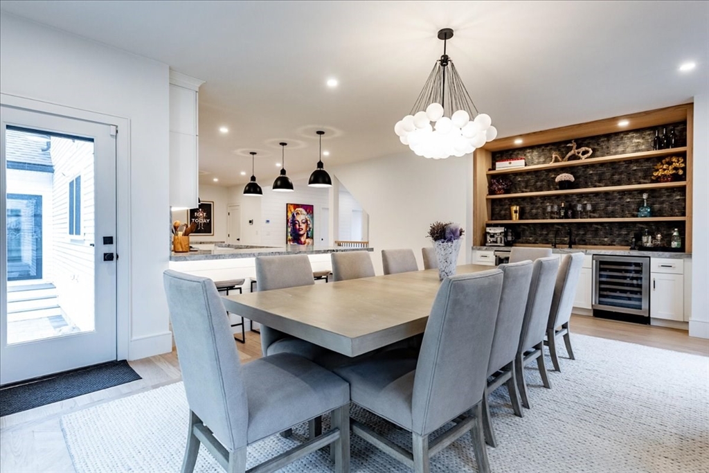 5 Brookside Lane Burlington, MA 01803 - Photo 14 of 42 a view of a dining room with furniture and wooden floor