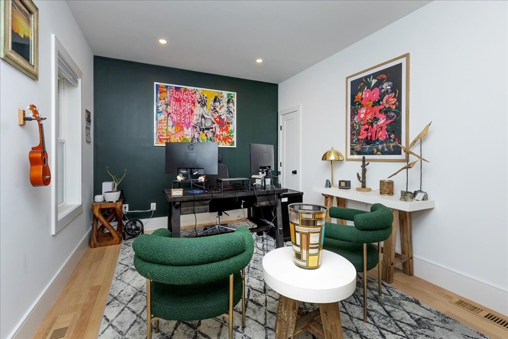 5 Brookside Lane Burlington, MA 01803 - Photo 15 of 42 a living room with furniture a rug and a flat screen tv